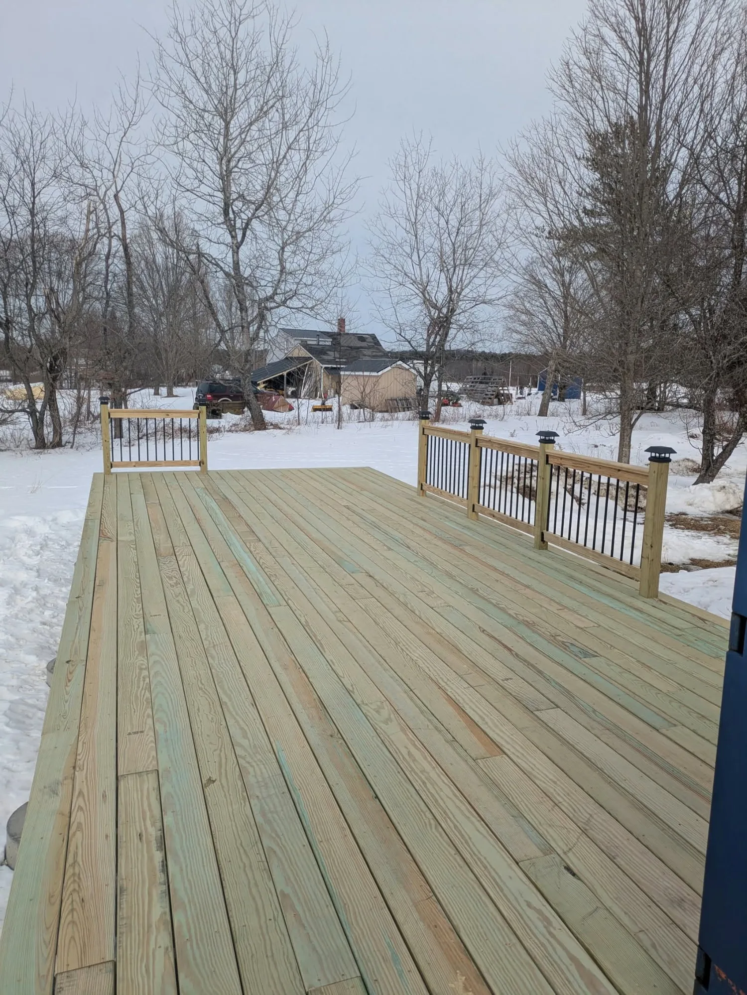 Custom deck by Stronghold Deck Company · Central Maine